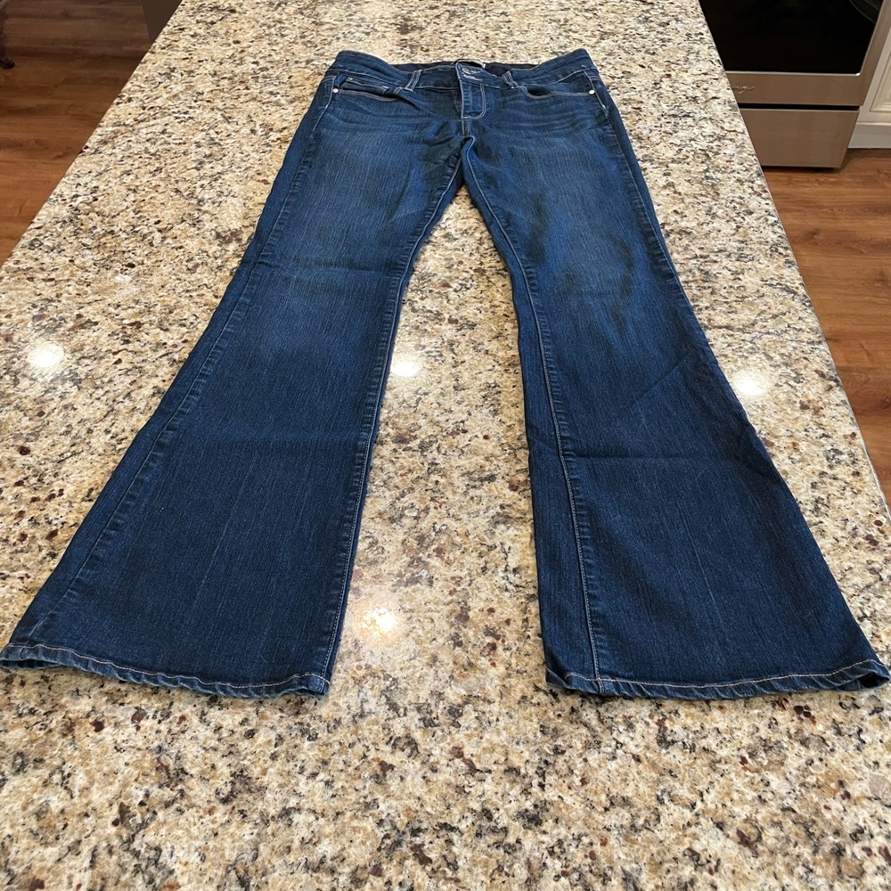 Paige low rise boot cut jeans.